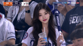 A hyper-realistic AI-generated stadium crowd moment
