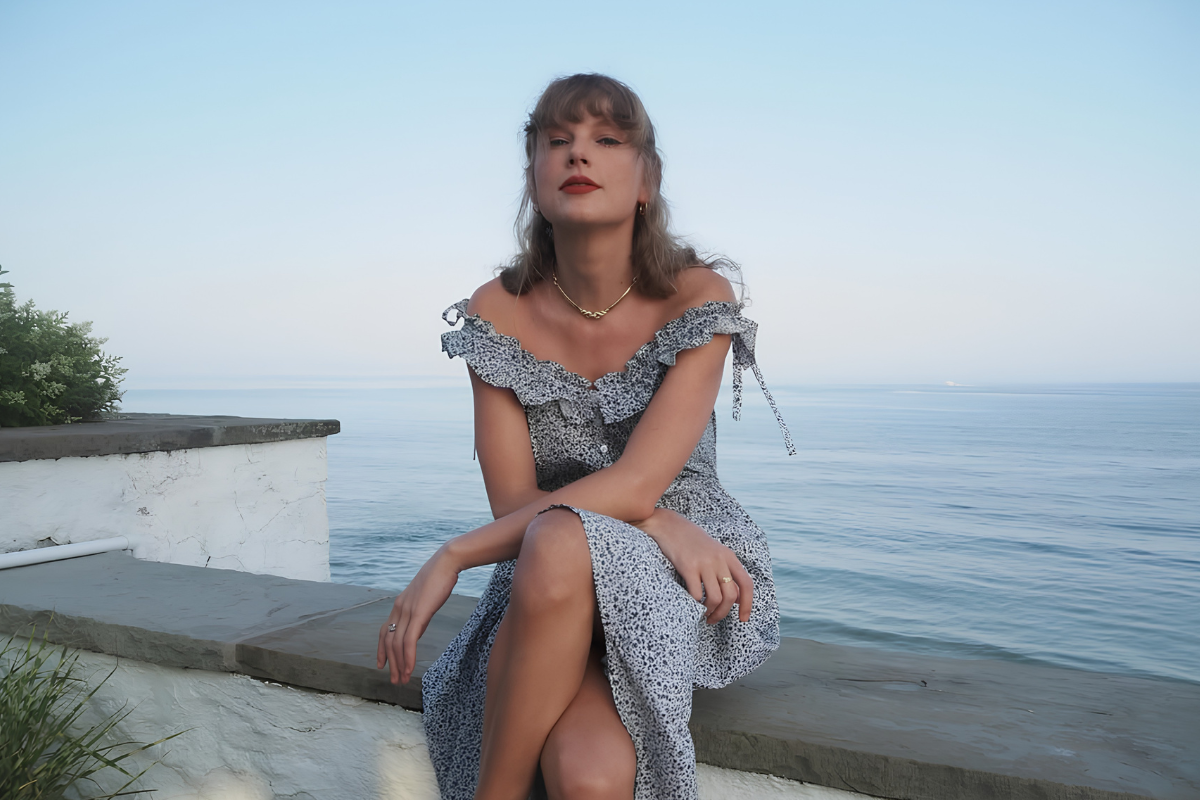 Taylor Swift Sitting by the Ocean