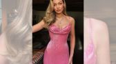 Gigi Hadid in a pink gown for Taylor Swift's wedding