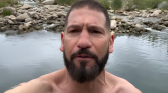 Jon Bernthal in a river