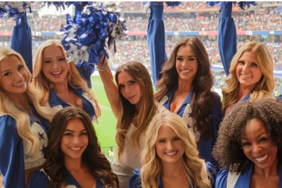 Victoria Beckham with the Dallas Cowboys Cheerleaders