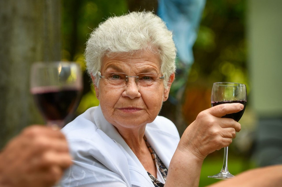 Grandmother drinking alcohol
