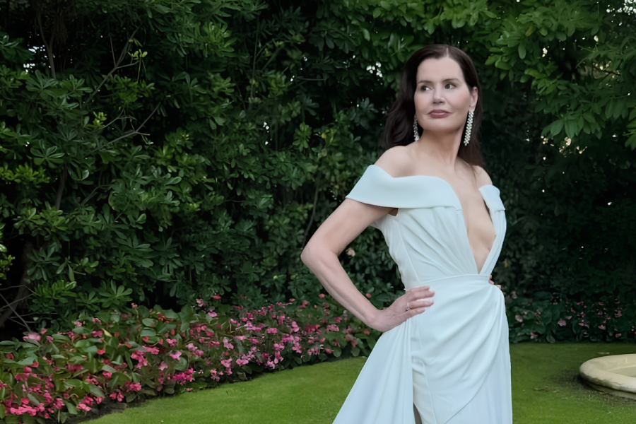 Geena Davis wearing a white classy gown