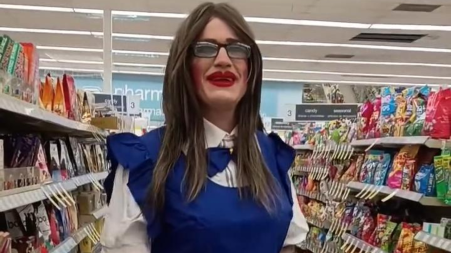 Adult In Dress Walking Through Sweet Aisle