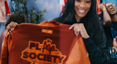 A'ja Wilson holding her collection