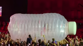 Katy Perry Giant Bottle Crowd Surfing