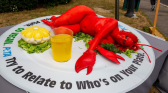 PETA's 'human lobster' on a plate outside Maine Lobster Fest