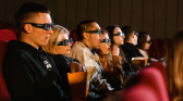 People watching movie in a cinema