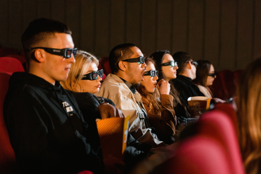 People watching movie in a cinema