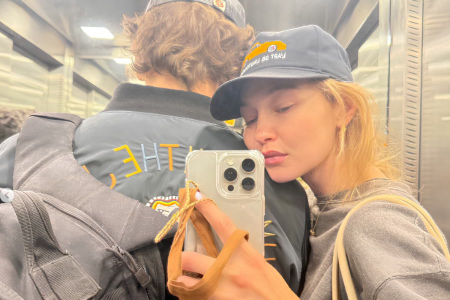 Gigi Hadid mirror shot photo with a gentleman