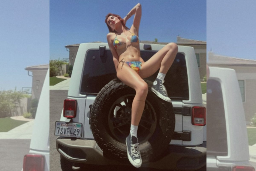 Bella Thorne wears Converse sneakers with a bikini