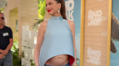 Anne Hathaway showing her baby bump