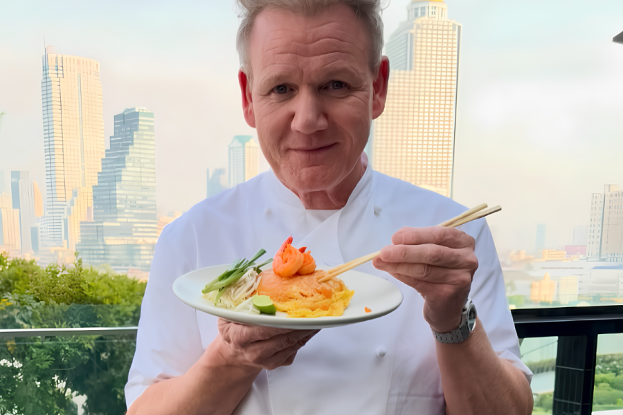 Gordon Ramsay holding his dish