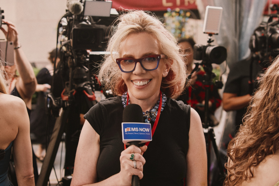 Molly Jong-Fast holding a microphone