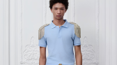 Model wearing Dior’s embellished polo shirts