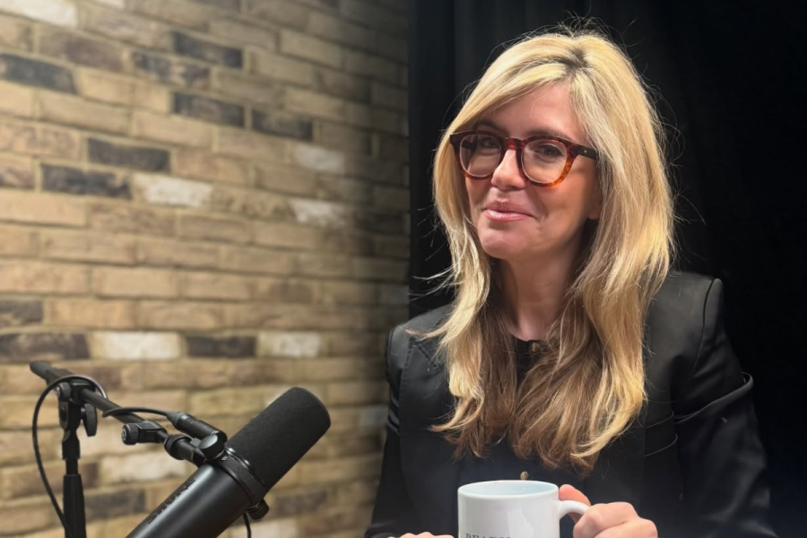 Emma Barnett holding a cup of coffee