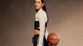 Caitlin Clark holding a basketball