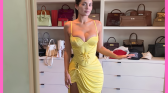 Kylie Jenner tries on the vintage yellow Versace corset look