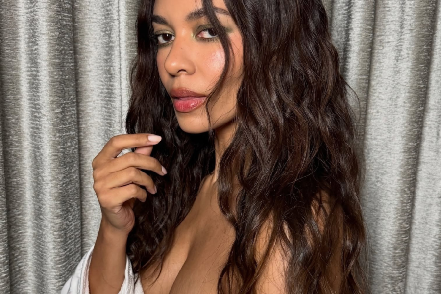 Aurora James in curly hair