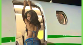 Tyla posting in a plane