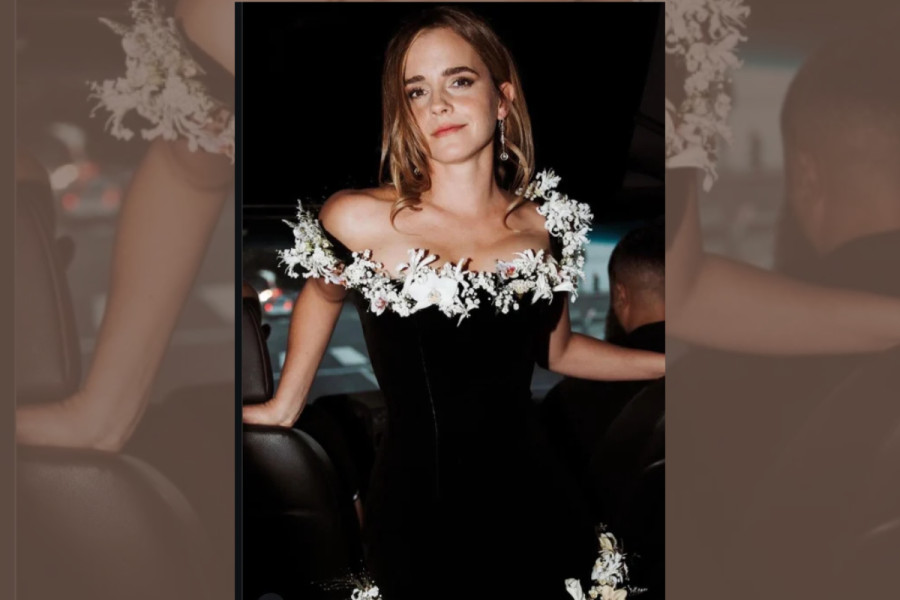 Emma Watson in a black floral dress at the Lucas