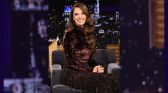 Hailee Steinfeld wears a crushed velvet top and fringe skirt
