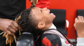 dad shaves son locs