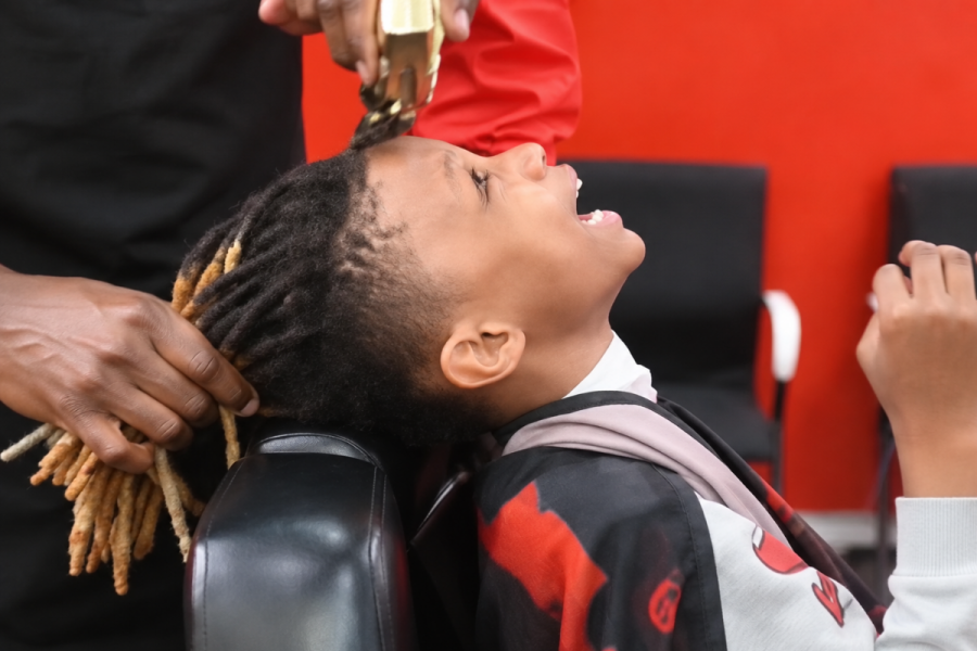 dad shaves son locs