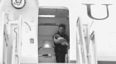 JD Vance holding his child on the plane