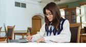 Student writing an essay