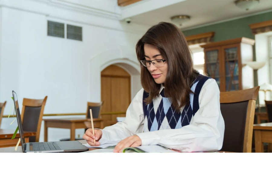 Student writing an essay